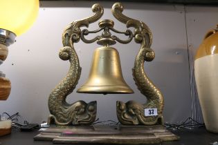 Large Early 20thC Heavy Brass table bell with fish supports. 41cm in Height