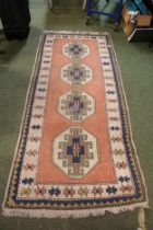 Long Salmon and cream Carpet with tassel ends 220cm in Length