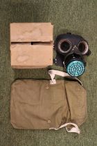 A Unused WW2 Gas Mask with storage box