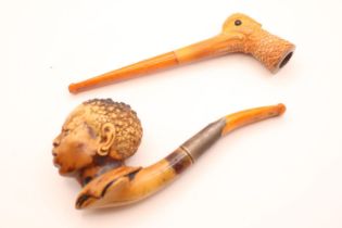 Blackamoor Meerschaum pipe in case and a Pipe in the form of a Common Snipe Head cased B Hoffmann