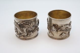 Pair of Chinese Silver Napkin rings decorated with Three toed Dragons 73g total weight