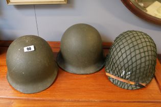 Collection of 3 Military Helmets to include 1950s American Helmet, 1966 Helmet and another one