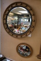 19thC Circular mirror with beaded border and bevel edge and a smaller mirror