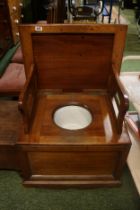 Hardwood Commode seat with folding elbows and porcelain bowl