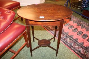 19thC Oval Mahogany table with hinged top over tapering legs and cruciform base