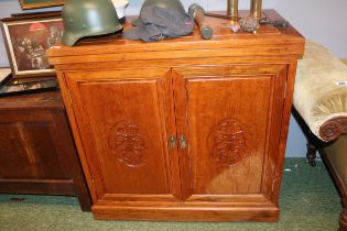 Chinese Hardwood Cabinet with extending leaf with carved front 91cm in Width