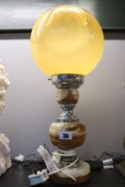Art Deco Style Onyx stemmed lamp with spherical glass globe