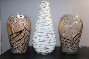 Pair of Art Glass Vases of mottled decoration and a White glass vase with overlaid decoration