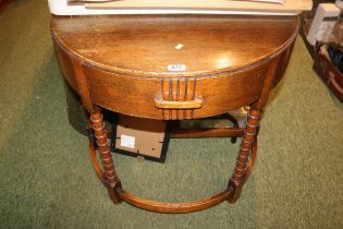 1930s Oak Demi Lune table with single drawer and turned legs