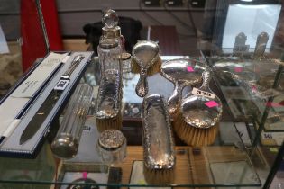 Collection of Edwardian Silver Backed Dressing table brushes and bottles