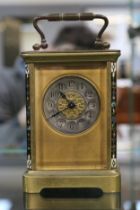 Antique Champleve carriage clock with numeral dial on bracket feet