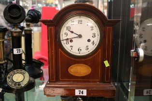 Edwardian domed top Mantel clock with numeral dial and inlaid shell motif with key