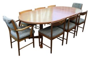 MacIntosh Mid Century Oval table with chairs 2 leaves supported on out swept legs. 220cm in Length
