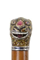 Indian Gemset Silver topped walking cane modelled as a tigers head with enamelled detail mounted