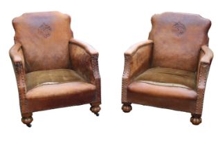 Pair of French Arts & Crafts Leather Saloon club chairs with embossed floral & Butterfly motifs to