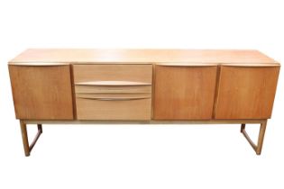 A H MacIntosh of Kirkcaldy Mid Century Teak Sideboard of 3 drawers flanked by cupboards on