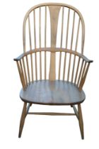 Ercol Blonde Elm Windsor Elbow chair with curved arms over tapering legs with Light blue Label
