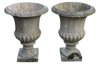 A Pair of Large Campana Urn Garden planters with Leaf decorated rim over gadrooned bowl and square
