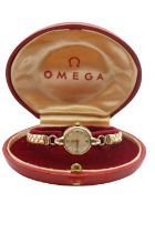 Ladies Omega 9ct Gold Cocktail watch with numeral dial 19mm Case on with expanding bracelet in