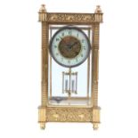 Late 19th Century French lacquered brass four-glass mantel clock with white enamel Numeral ring