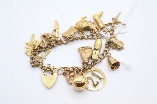 Ladies 9ct Gold Charm bracelet of assorted charms 21g total weight