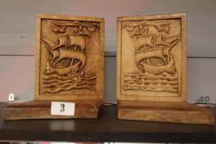 Pair of Arts & Crafts Bookends with Galleon carved decoration. 20cm in Height