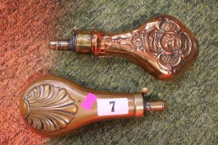 2 19thC Copper Powder Flasks with embossed Stag and foliate decoration and brass fittings