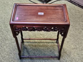 Chinese Rosewood rectangular with carved Flora and Fauna pierced frieze over shaped stretcher by