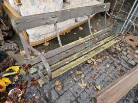 Wrought metal clatted garden bench