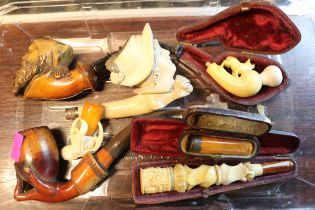 Collection of assorted Meerschaum pipes of assorted designs inc. Bird Claw design, Bearded Men's