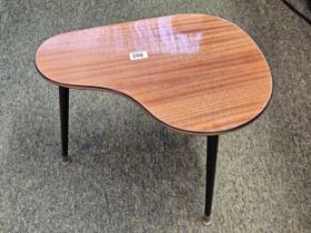 1950s Shaped top Melamine table on tapering legs terminating on brass pad feet