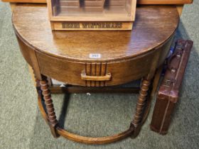 Art Deco Half Moon Oak hall table with single drawer over curved stretcher