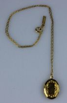 9ct Gold Necklace Suspending an Oval Locket 4.71gms. Total necklace length 40cm.