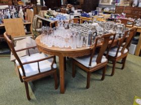 20thC Chinese Hardwood Oval dining table with 2 leaves and a set of 6 dining chairs