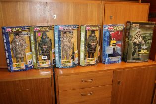 5 Boxed H M Forces figures and a boxed Elite Force WWII British Paratrooper