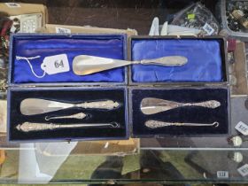 Collection of Cased Silver Shoe Horns and Button hooks CAT CHANGE