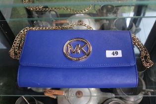 Michael Kors Ladies bag in blue with gilt chain and Emblem