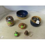 A Royal Doulton tobacco jar, bowl, pepper pot, teapot lid, miniature flask and lidded jar