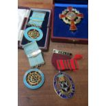 A Jemaintiendrai medal, three silver Masonic medals and a coin
