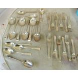 Six silver serving spoons, six tablespoons, twelve forks (two sizes) and sauce ladle 39oz
