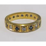 A sapphire and diamond eternity ring (probably high carat) size L