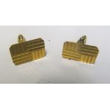 A pair 9ct gold cufflinks