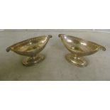A pair silver and pierced dishes
