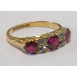 An 18ct gold synthetic ruby and diamond ring size L/M