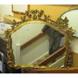 A gilt overmantel mirror