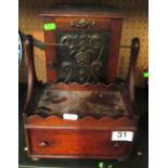 A Smokers cabinet with cased pipe and a mahogany box