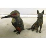 A cold painted bird and bronze dog