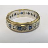 A 9ct eternity ring set blue and white stones size L