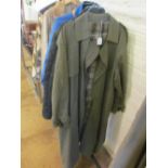 A gent's Marks & Spencers trench style raincoat and a Brooks Brother raincoat with suede collar