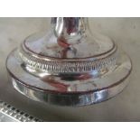 A pair of silver plated candleabra